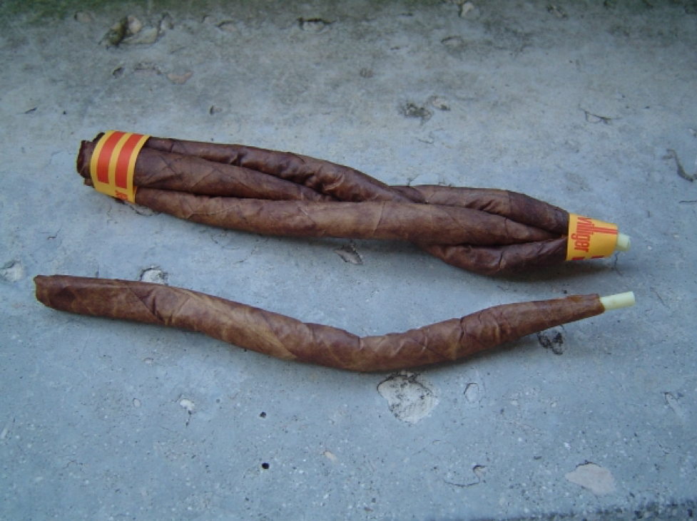 Four Culebra cigars with one unravelled