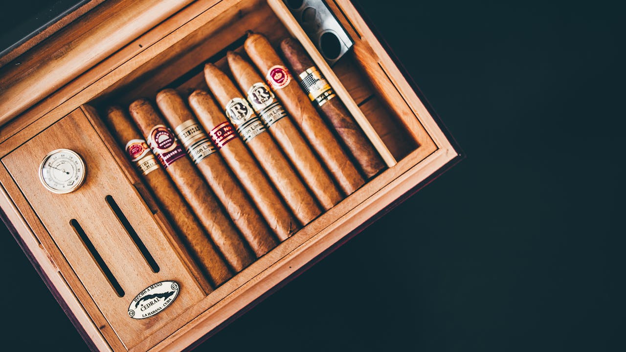 A humidor with multiple brands of cigars