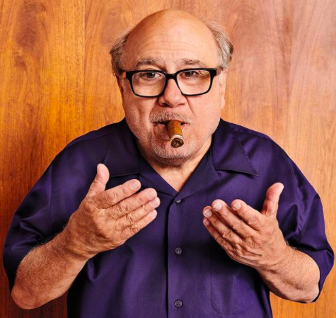 Danny DeVito with a cigar in his mouth