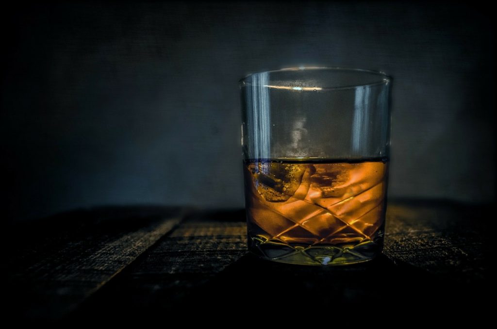 Whisky glass on table